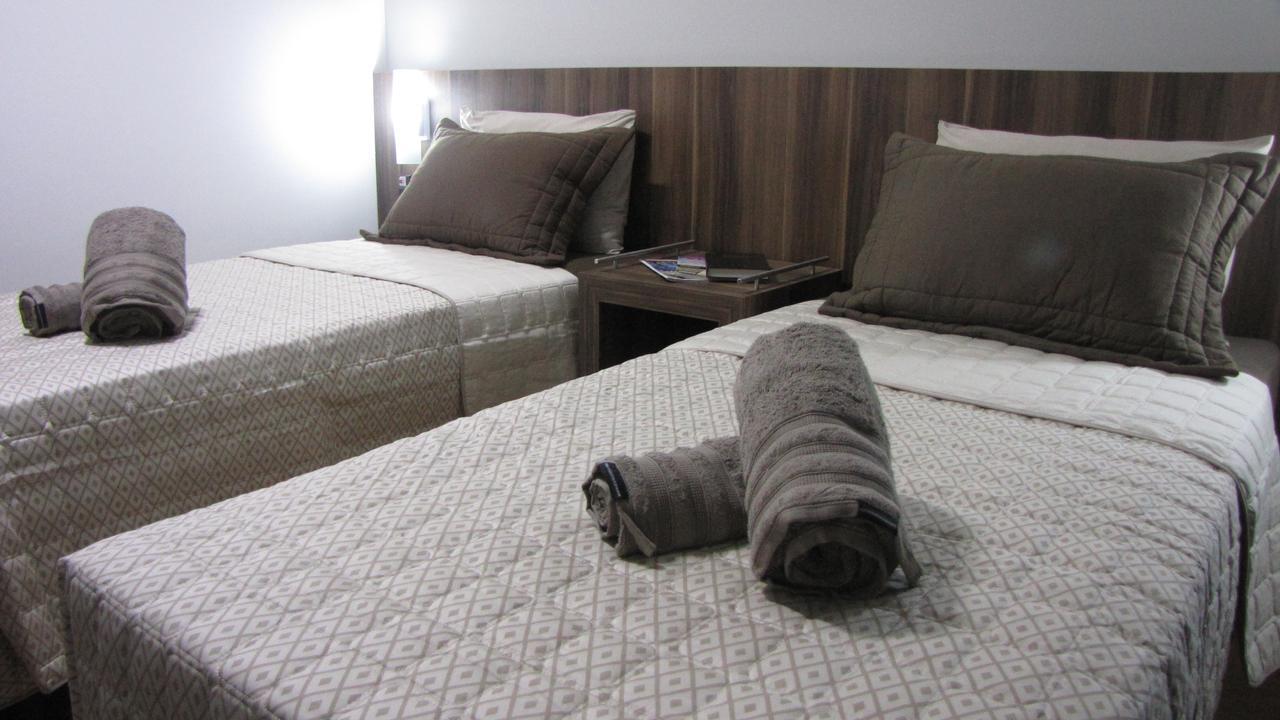 Quarto Deluxe com Cama de Casal ou 2 de Solteiro e Varanda